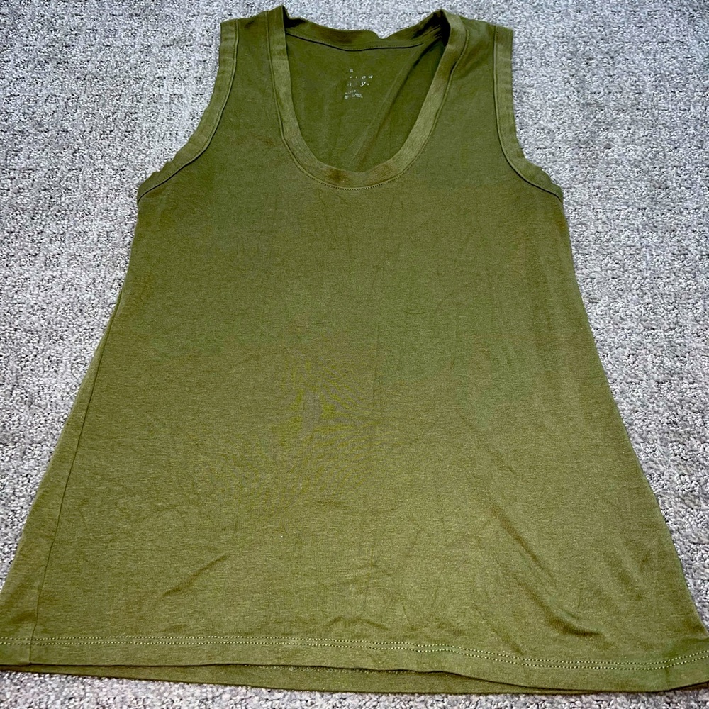 A. New. Day Tank; green; large